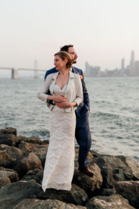 Bride and Groom Treasure Island with San Francisco in the background