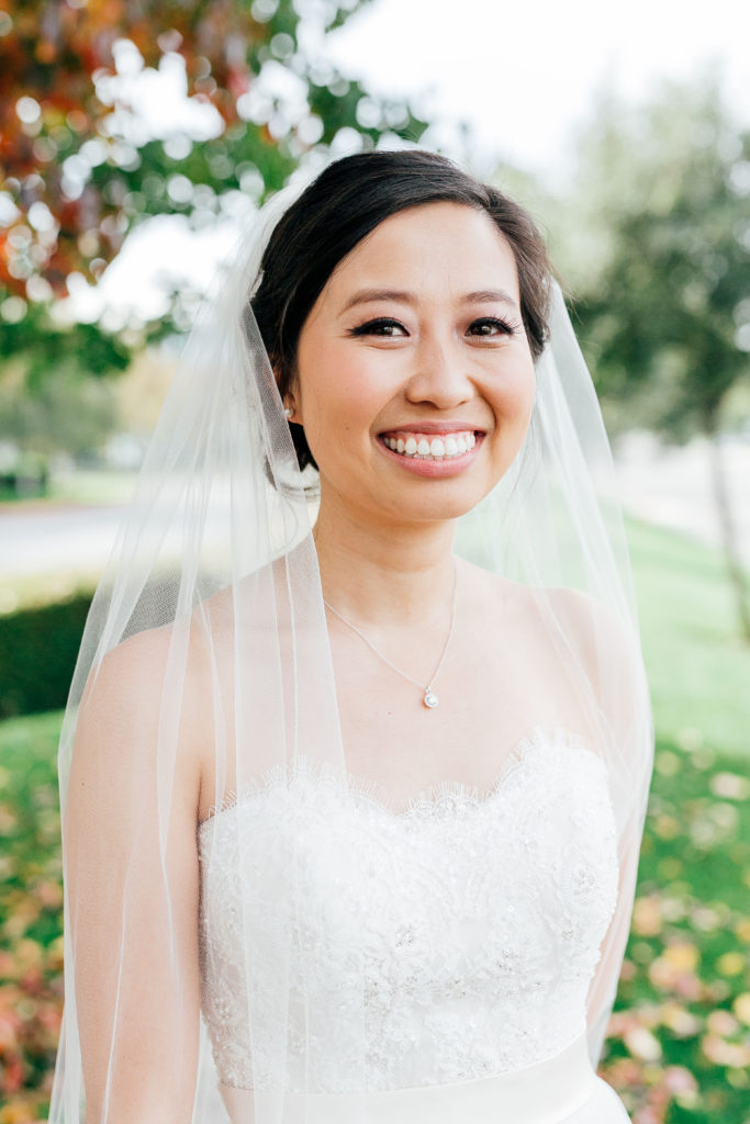 bride smiles outdoors