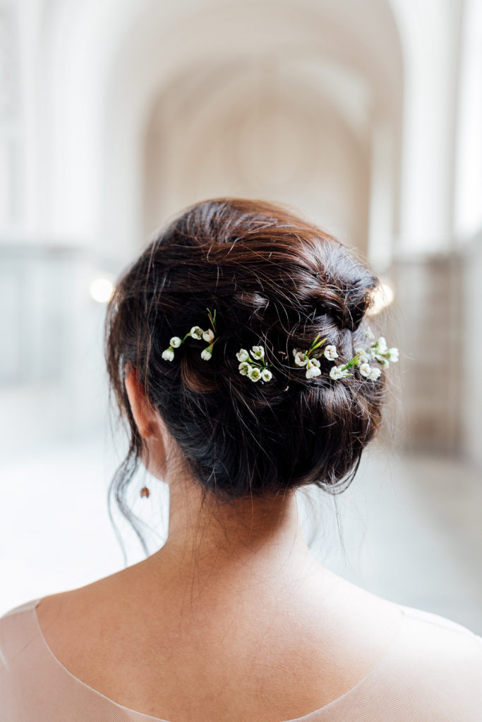 Detail shot of bride's hair with flowers