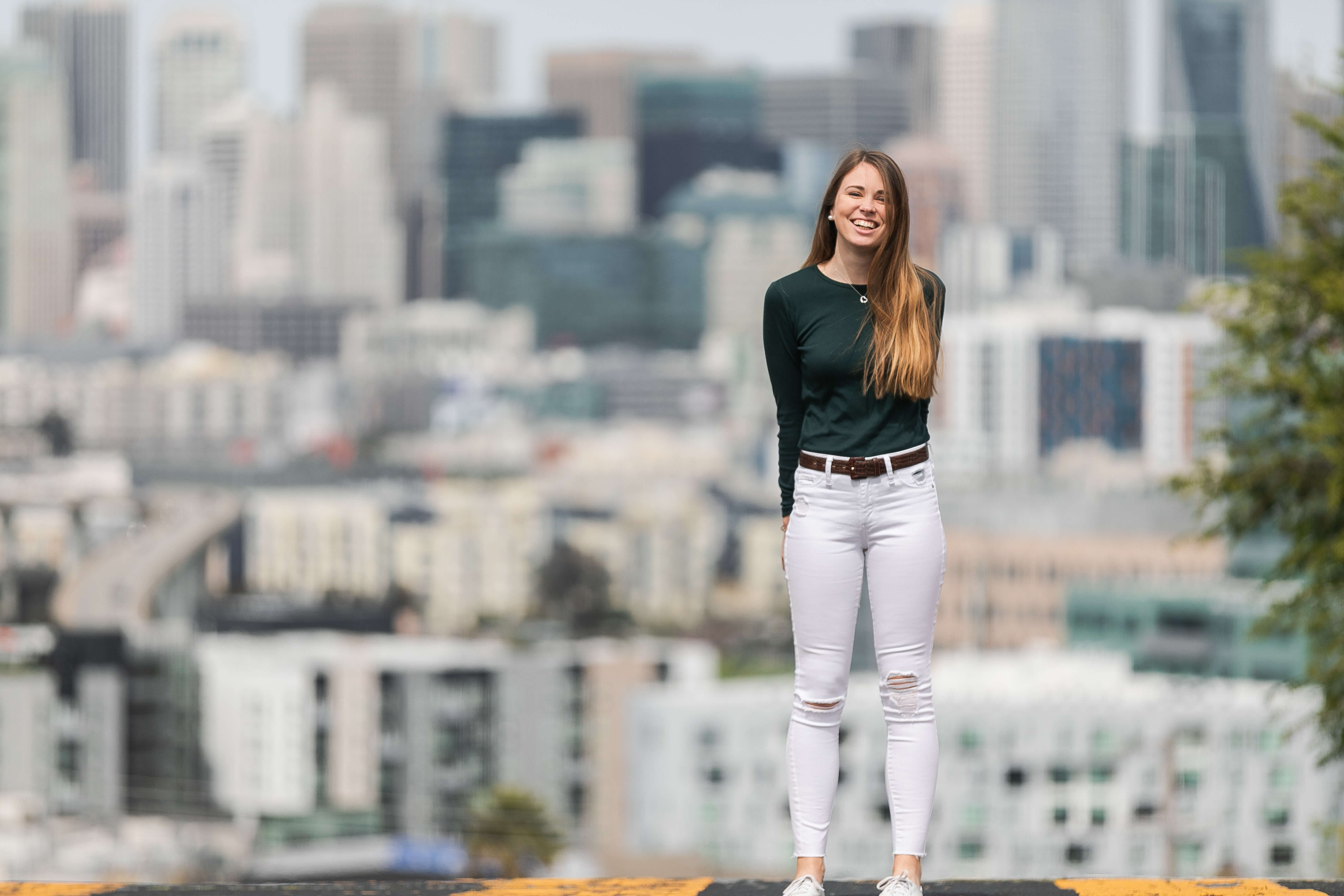 A picture of aspiring photographer, Stephanie, in San Francisco, whose photography internship with Comeplum taught her lessons on how to succeed as a San Francisco wedding photographer.
