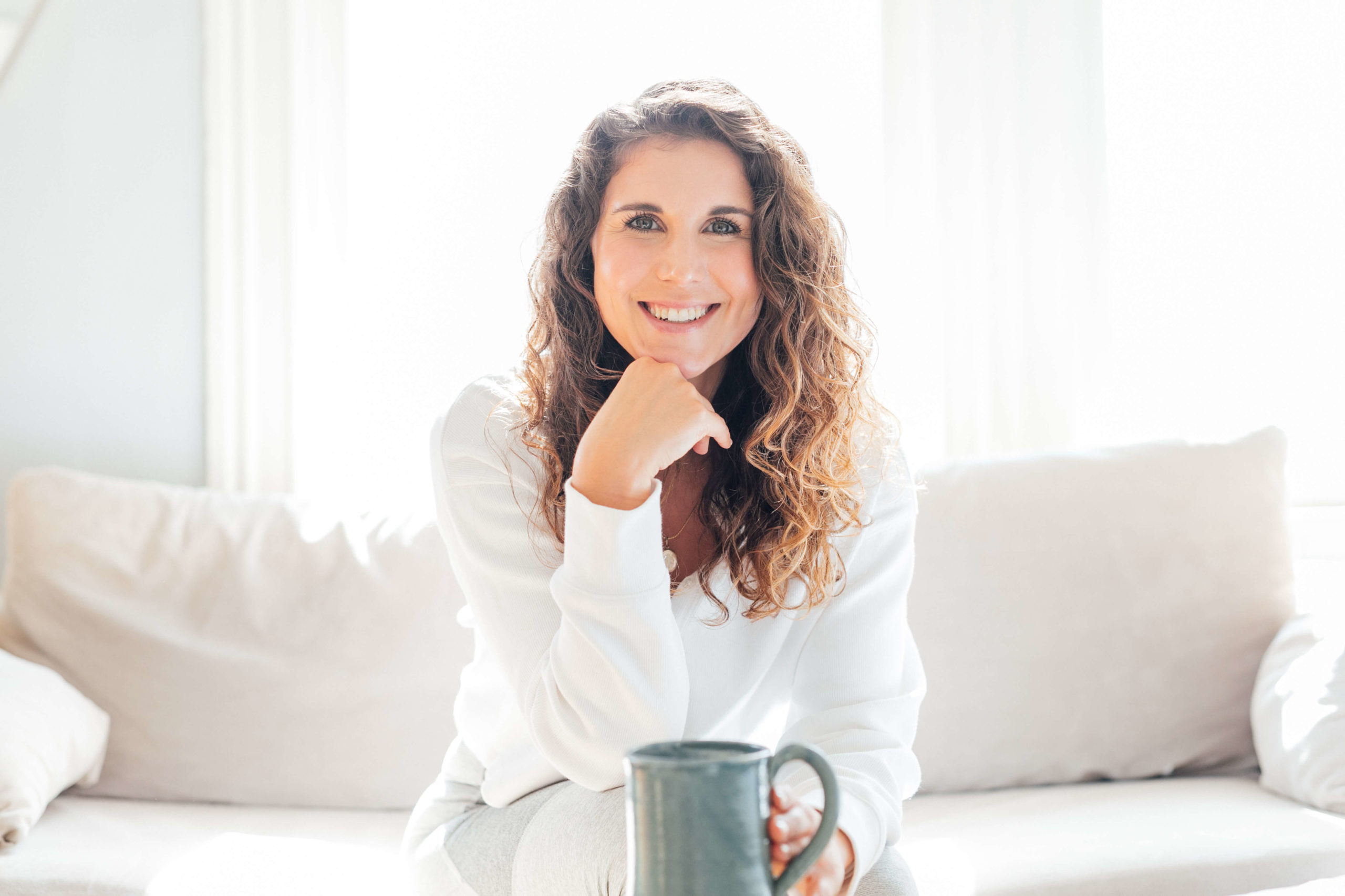 Life coach, Stefani Mccullah poses for a personal branding photoshoot, and shares her tips for how to make your thoughts work for you.